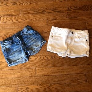 Two pairs of toddler girl shorts.